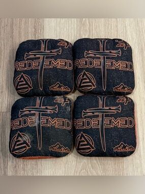 Predator Redeemed Professional Level Cornhole Bags Black and Orange  (Set of 4)